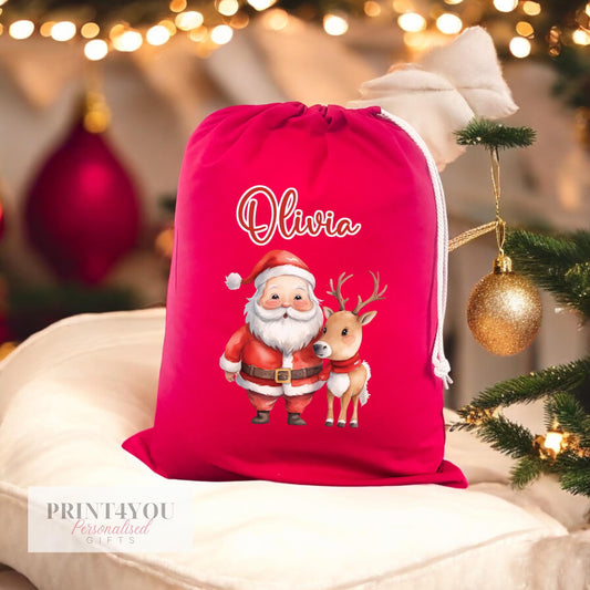 Personalised red Christmas sack with Santa and reindeer design and custom name, front view