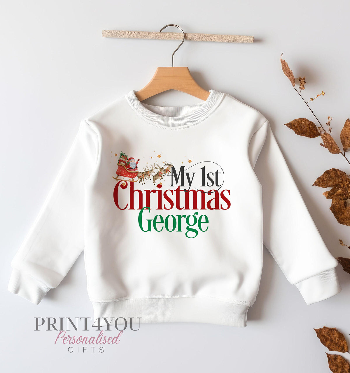 White baby sweatshirt with Santa's sleigh Christmas print and personalised name, size 6-12 months