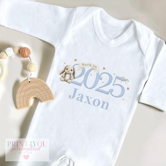 Personalised 'Born In 2025' Blue Bunny design baby bib, printed on soft cotton.