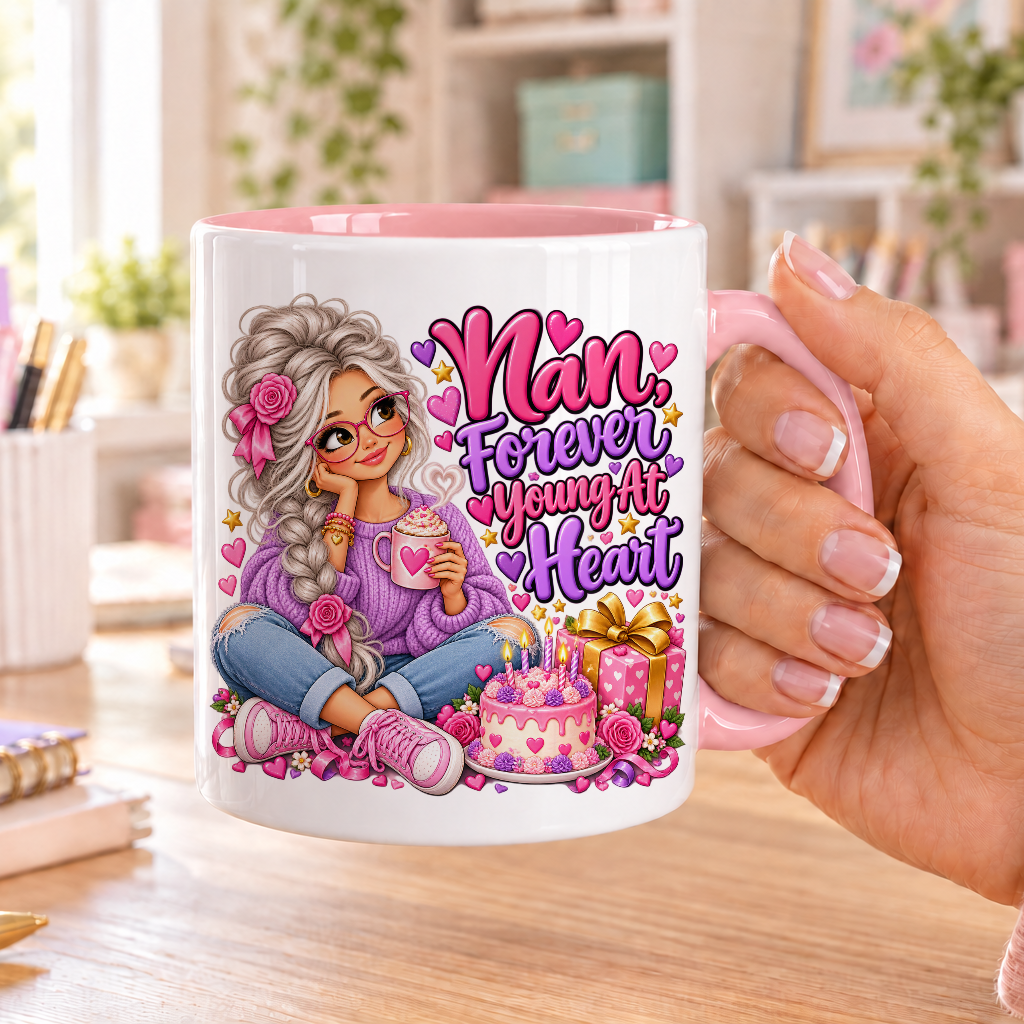 Nan Forever Young at Heart birthday design – white ceramic mug with pink handle and pink inside