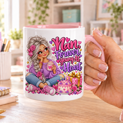 Nan Forever Young at Heart birthday design – white ceramic mug with pink handle and pink inside