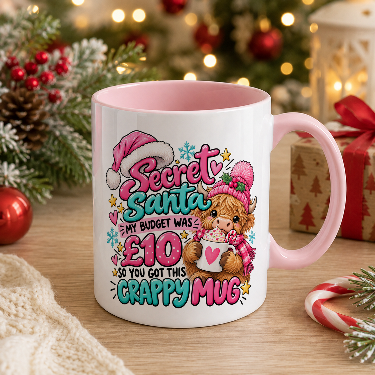 Highland Cow Secret Santa Crappy Mug – £10 Budget – white mug with pink handle and inside