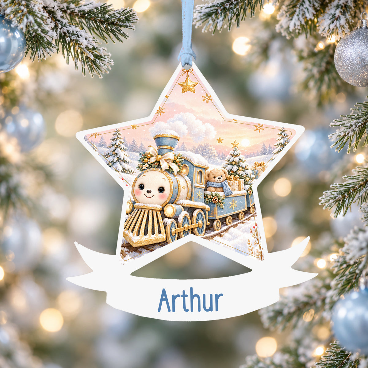 Personalised blue and gold Christmas train acrylic star Christmas bauble with custom name, hanging on a Christmas tree with baby blue ribbon