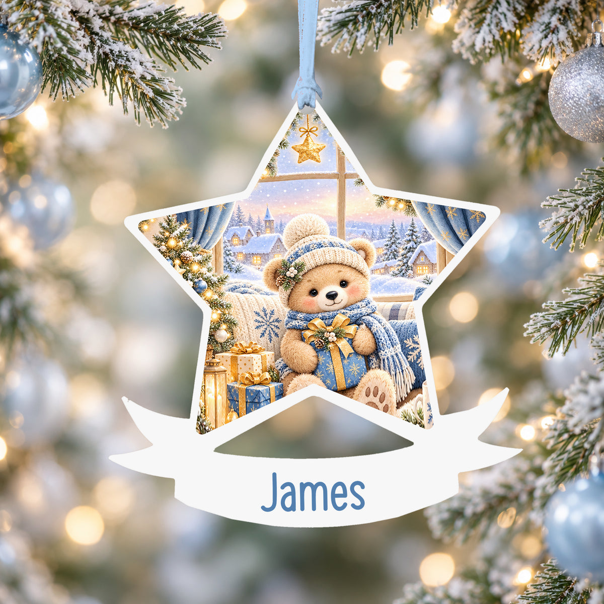 Personalised blue Christmas window acrylic star Christmas bauble with custom name, hanging on a Christmas tree with baby blue ribbon