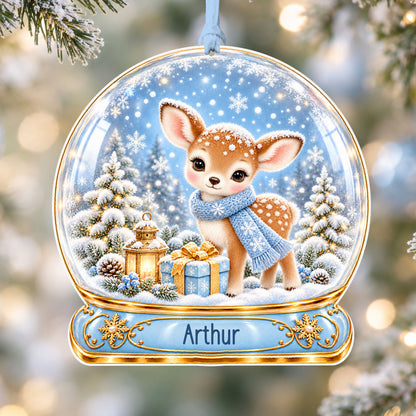 Personalised blue fawn acrylic snow globe Christmas bauble with custom name, hanging on a Christmas tree with baby blue ribbon