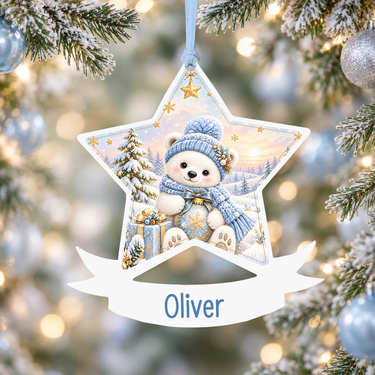 Personalised blue polar bear acrylic star Christmas bauble with custom name, hanging on a Christmas tree with baby blue ribbon