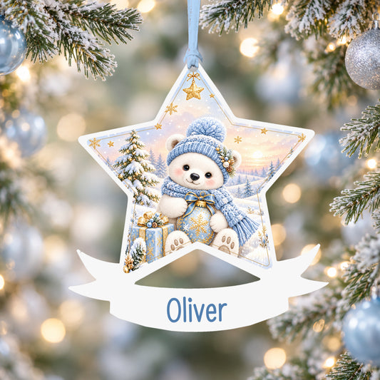 Personalised blue polar bear acrylic star Christmas bauble with custom name, hanging on a Christmas tree with baby blue ribbon