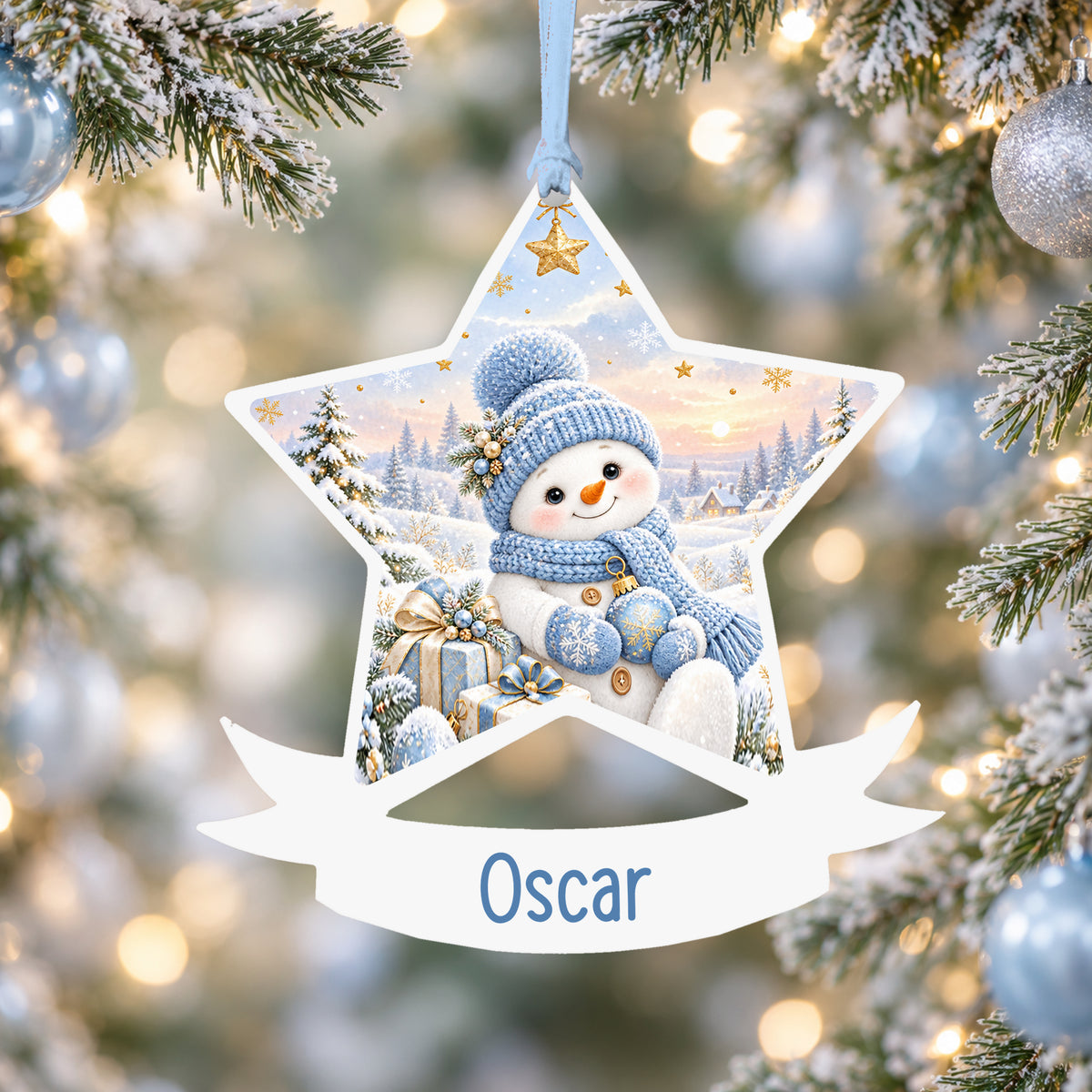 Personalised blue snowman acrylic star Christmas bauble with custom name, hanging on a Christmas tree with baby blue ribbon