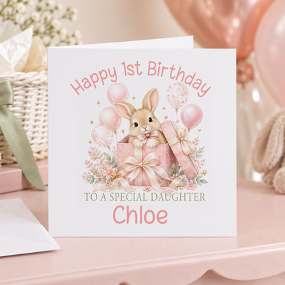 Personalised Bunny in a Present 1st Birthday Card, Any Name & Relation, 6x6 Inch