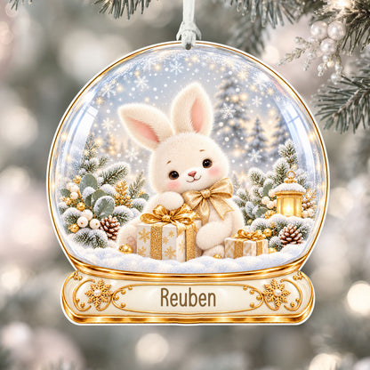 Personalised champagne bunny acrylic snow globe Christmas bauble with custom name, hanging on a Christmas tree with white ribbon