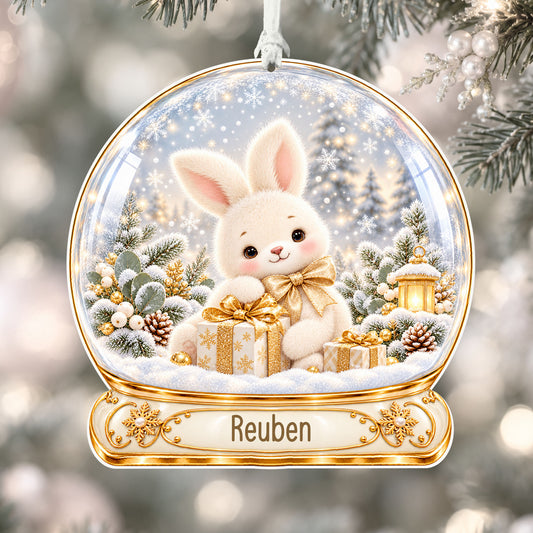Personalised champagne bunny acrylic snow globe Christmas bauble with custom name, hanging on a Christmas tree with white ribbon