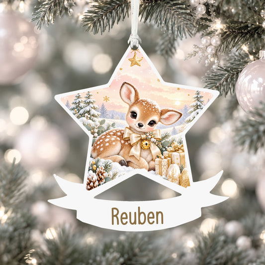 Personalised champagne fawn acrylic star Christmas bauble with custom name, hanging on a Christmas tree with white ribbon