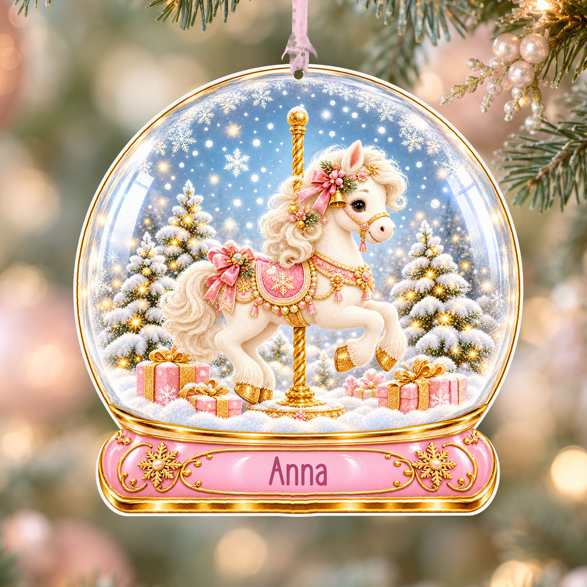 Personalised Christmas carousel acrylic snow globe Christmas bauble with custom name, hanging on a Christmas tree with baby pink ribbon