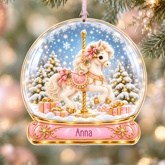 Personalised Christmas carousel acrylic snow globe Christmas bauble with custom name, hanging on a Christmas tree with baby pink ribbon