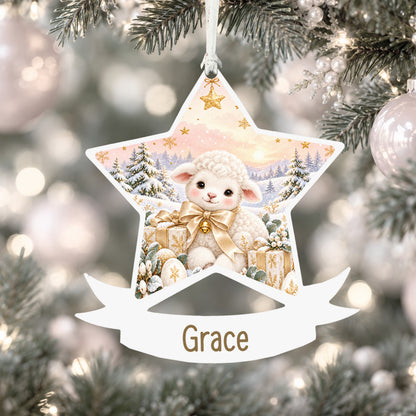 Personalised Christmas lamb acrylic star Christmas bauble with custom name, hanging on a Christmas tree with white ribbon