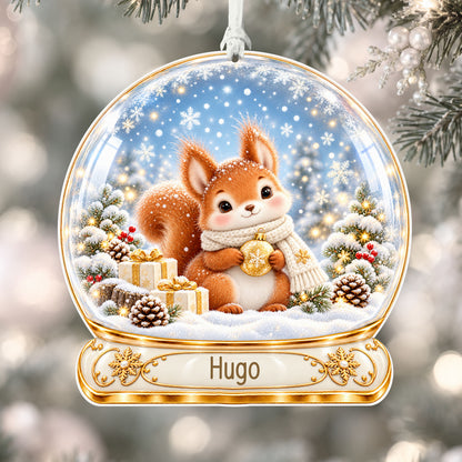 Personalised Christmas squirrel acrylic snow globe Christmas bauble with custom name, hanging on a Christmas tree with white ribbon