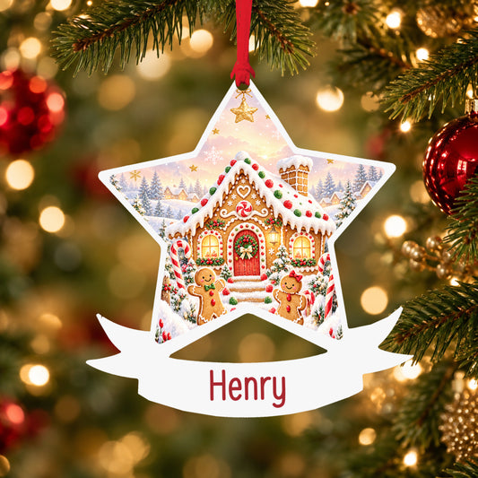 Personalised classic gingerbread cottage acrylic star Christmas bauble with custom name, hanging on a Christmas tree with red ribbon