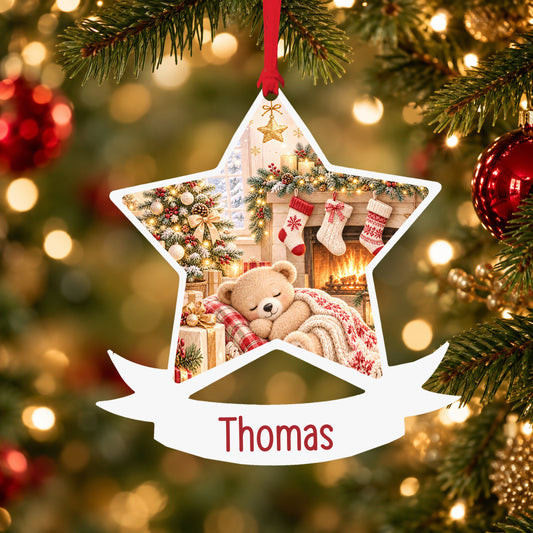 Personalised cosy Christmas fireplace acrylic star Christmas bauble with custom name, hanging on a Christmas tree with red ribbon