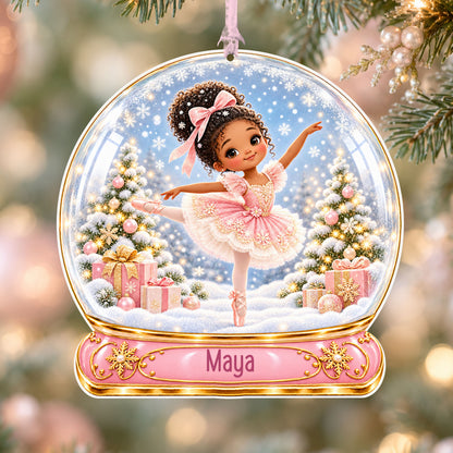 Personalised curly haired ballerina acrylic snow globe Christmas bauble with custom name, hanging on a Christmas tree with baby pink ribbon