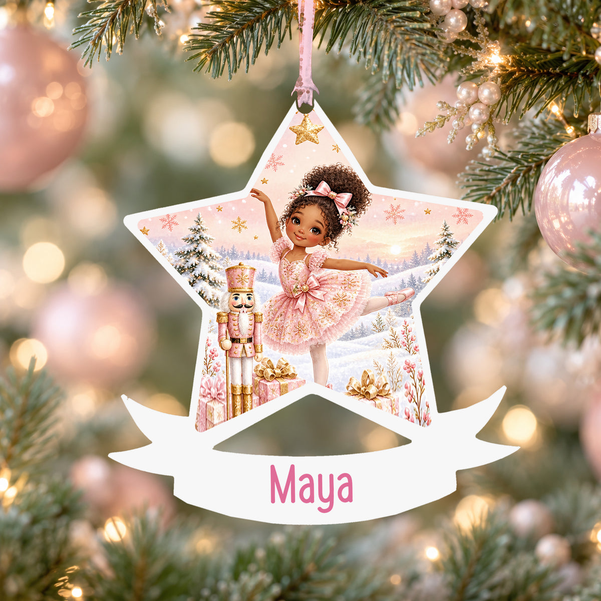 Personalised curly haired ballerina acrylic star Christmas bauble with custom name, hanging on a Christmas tree with baby pink ribbon