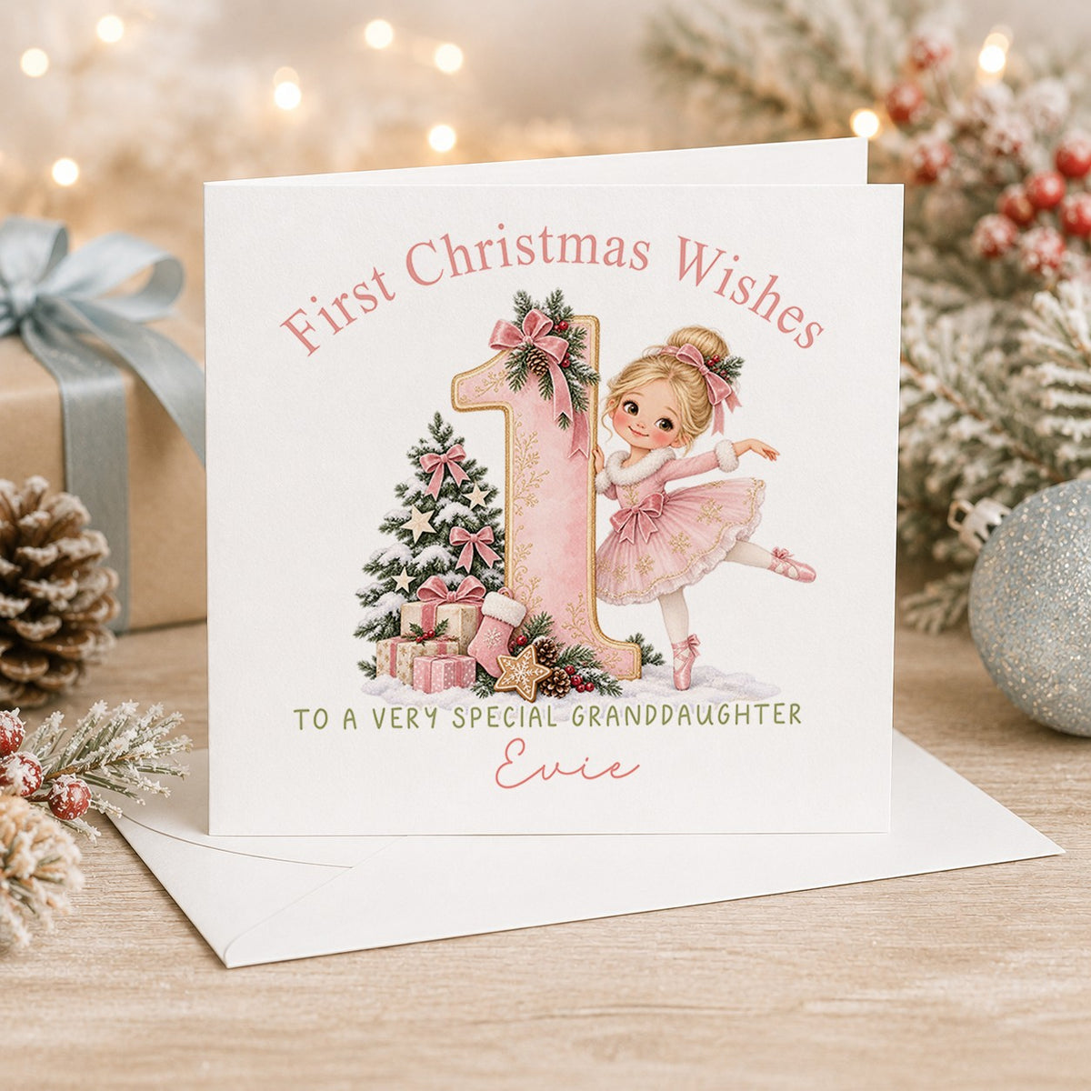 Personalised 6x6 First Christmas Wishes card with a blonde ballerina in a pink tutu dancing beside a pink and gold number 1, “To a very special granddaughter Evie”