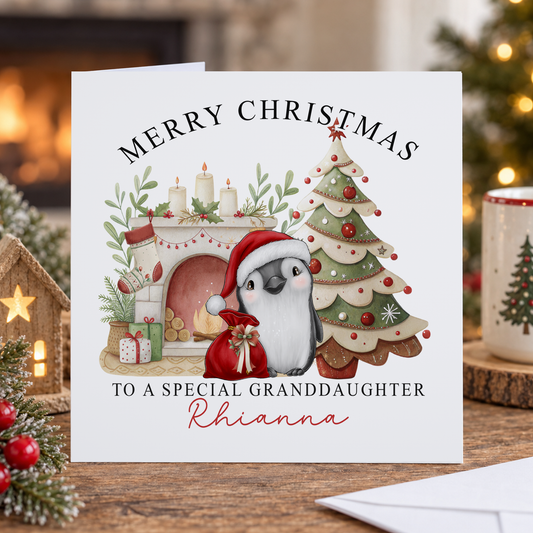 Personalised Granddaughter Christmas Card – Penguin by the Fireside, 6x6 Inch