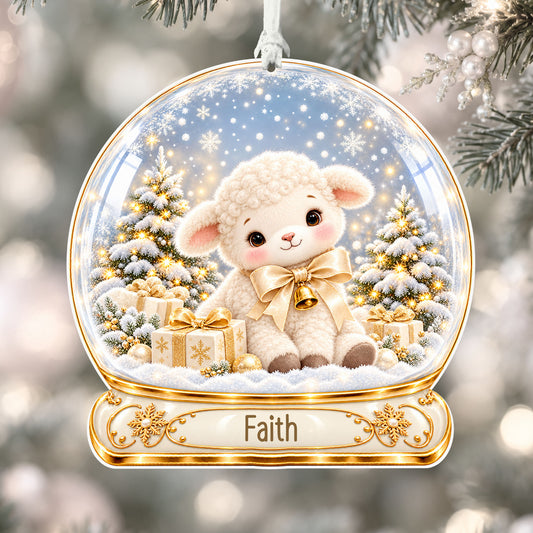 Personalised ivory lamb acrylic snow globe Christmas bauble with custom name, hanging on a Christmas tree with white ribbon