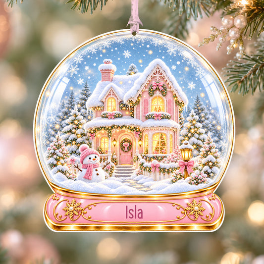 Personalised pink Christmas house acrylic snow globe Christmas bauble with custom name, hanging on a Christmas tree with baby pink ribbon
