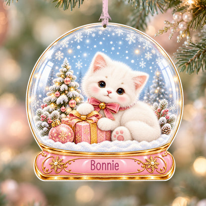 Personalised pink kitten acrylic snow globe Christmas bauble with custom name, hanging on a Christmas tree with baby pink ribbon