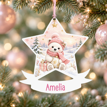 Personalised pink polar bear acrylic star Christmas bauble with custom name, hanging on a Christmas tree with baby pink ribbon