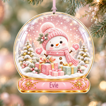 Personalised pink snowman acrylic snow globe Christmas bauble with custom name, hanging on a Christmas tree with baby pink ribbon