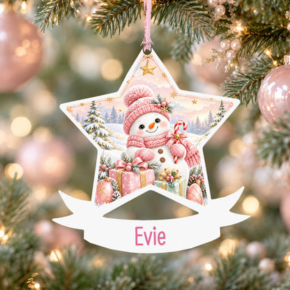 Personalised pink snowman acrylic star Christmas bauble with custom name, hanging on a Christmas tree with baby pink ribbon