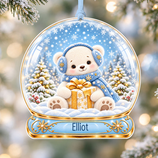 Personalised polar bear cub acrylic snow globe Christmas bauble with custom name, hanging on a Christmas tree with baby blue ribbon