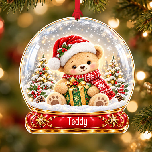 Personalised Santa hat teddy acrylic snow globe Christmas bauble with custom name, hanging on a Christmas tree with red ribbon