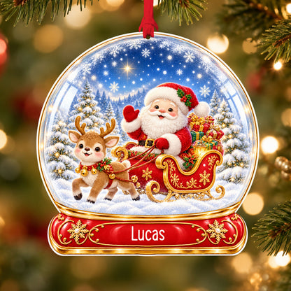 Personalised Santa sleigh acrylic snow globe Christmas bauble with custom name, hanging on a Christmas tree with red ribbon
