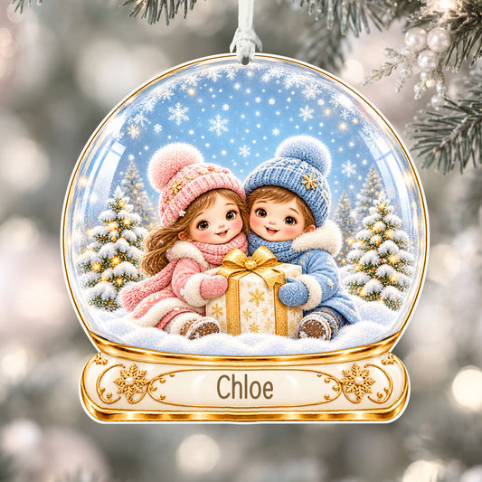 Personalised siblings with presents acrylic snow globe Christmas bauble with custom name, hanging on a Christmas tree with white ribbon