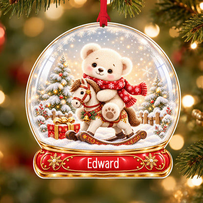 Personalised teddy on rocking horse acrylic snow globe Christmas bauble with custom name, hanging on a Christmas tree with red ribbon