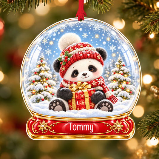 Personalised winter panda acrylic snow globe Christmas bauble with custom name, hanging on a Christmas tree with red ribbon