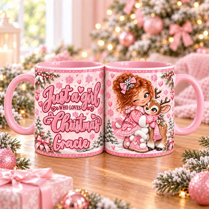 Personalised pink Christmas mug – Just a girl who loves Christmas with name, girl with red curly hair hugging a reindeer