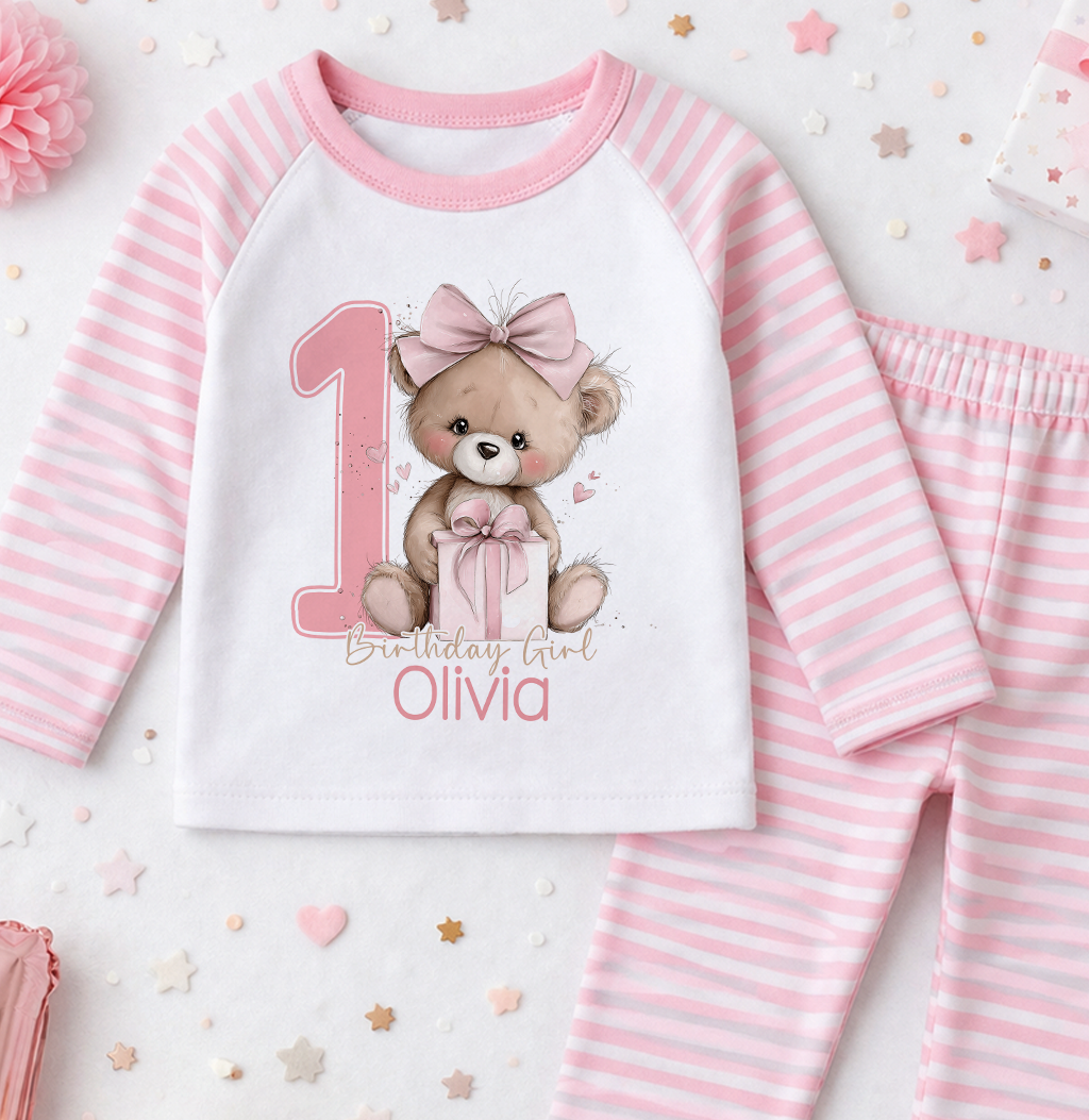 Personalised 1st birthday pyjamas, Teddy Bow and Present Birthday Girl design with name, pink and white striped