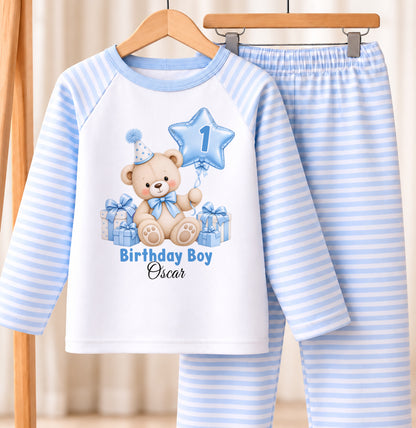 Personalised 1st birthday blue and white striped pyjamas, blue teddy bear star balloon design with name
