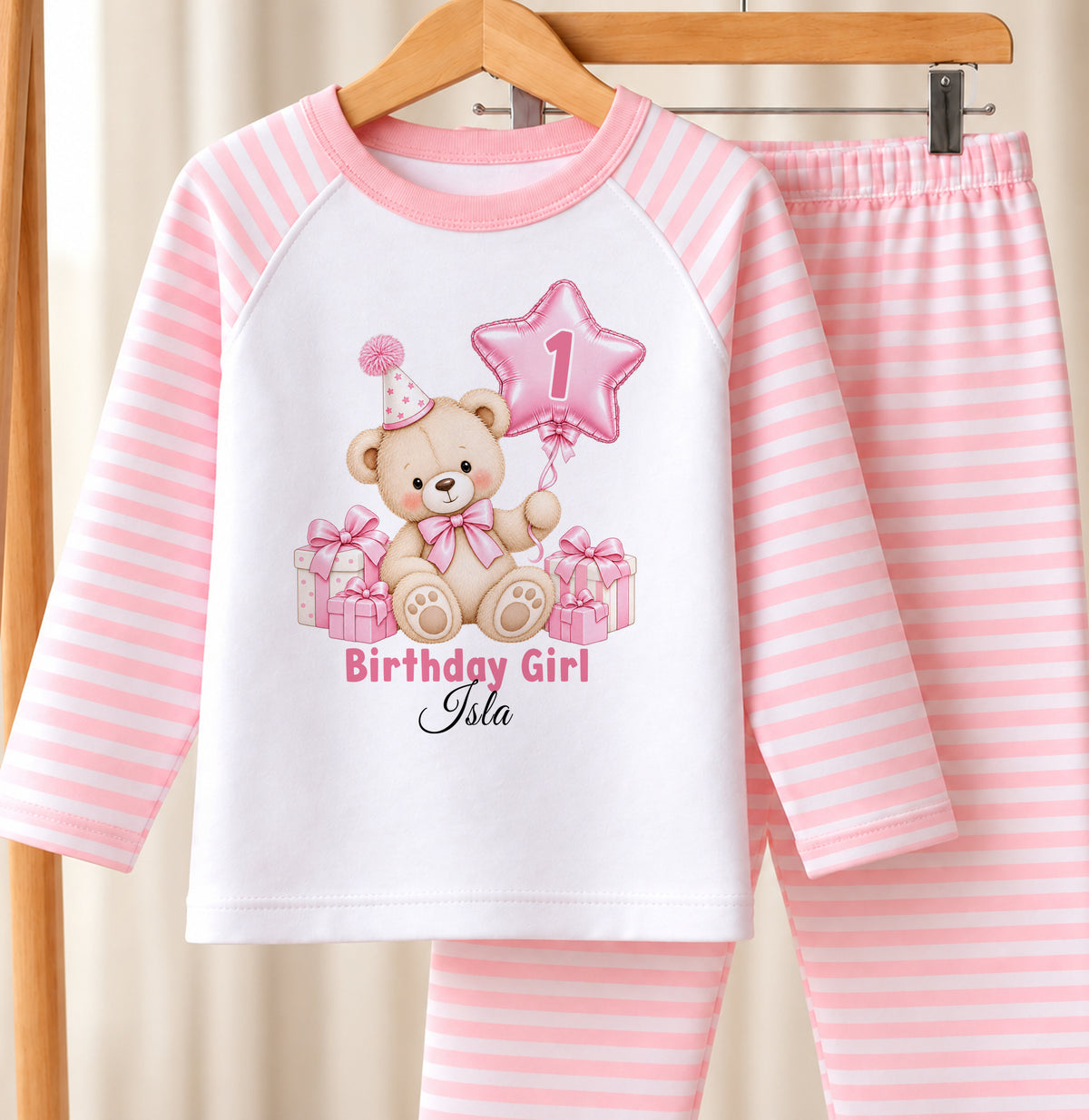 Personalised 1st birthday pink and white striped pyjamas, pink teddy bear star balloon design with name
