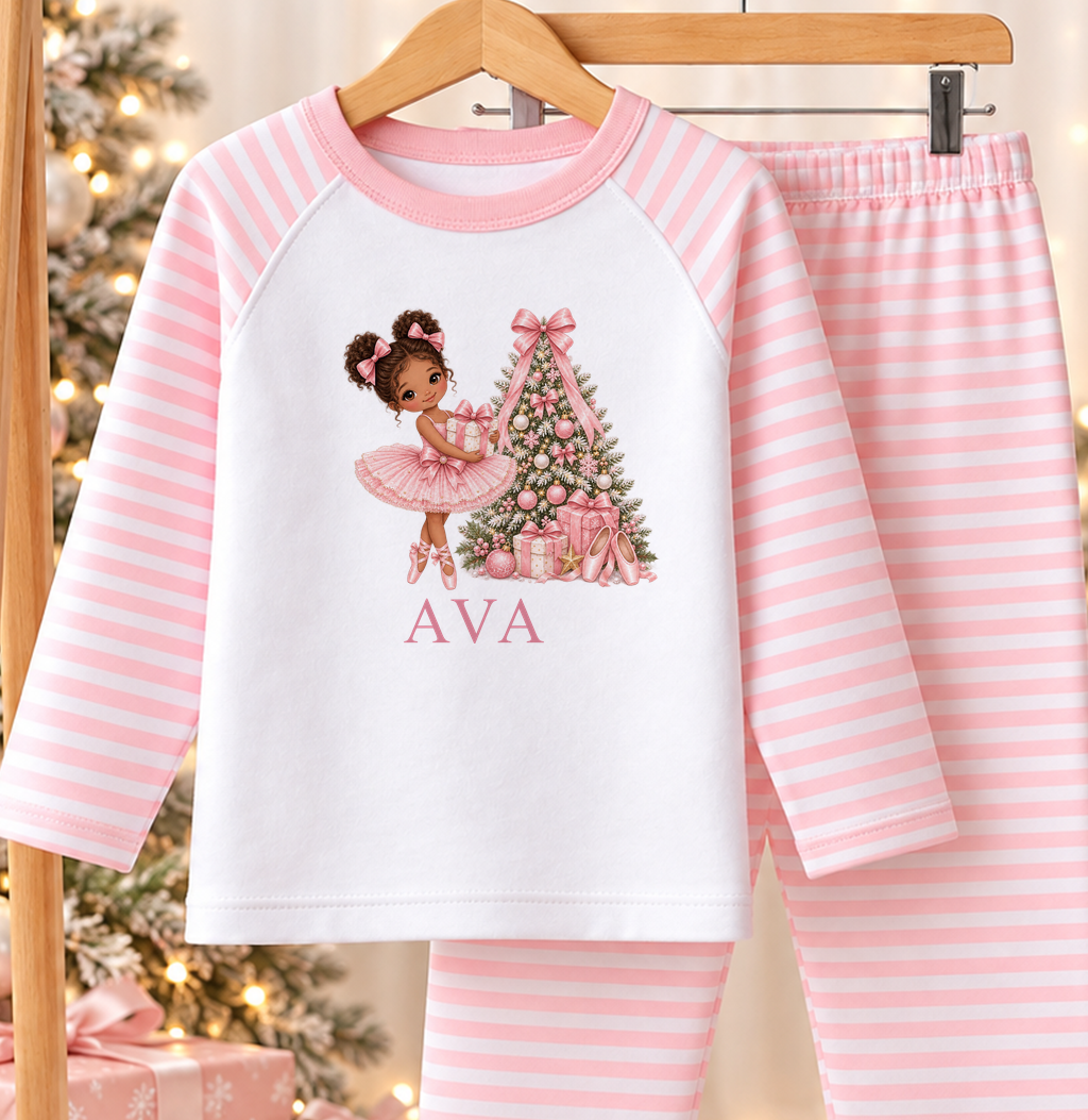 Personalised pink and white striped kids Christmas pyjamas with Curly Bun Ballerina design and a custom name printed on the front