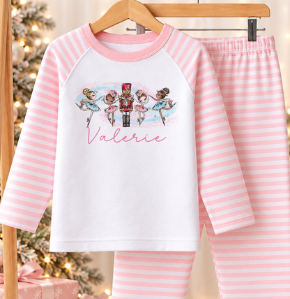 Personalised pink and white striped kids Christmas pyjamas with Ballerinas and Nutcracker design and a custom name printed on the front