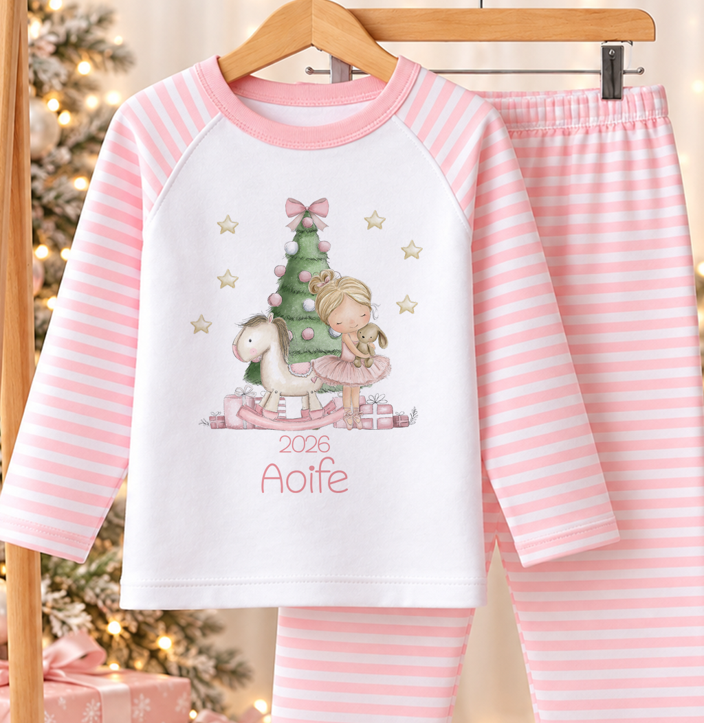 Personalised pink and white striped kids Christmas pyjamas with Christmas Ballerina design and a custom name printed on the front