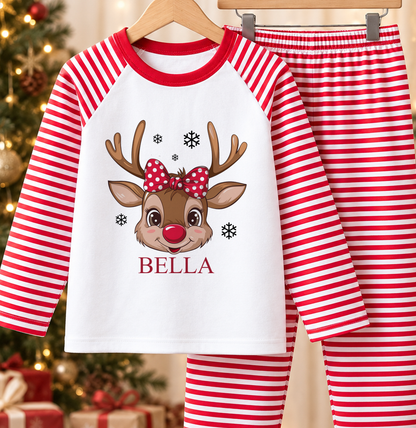 Personalised red and white striped kids Christmas pyjamas with Reindeer Face Polka Bow design and a custom name printed on the front