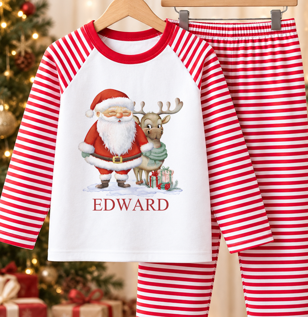 Personalised red and white striped kids Christmas pyjamas with Santa and Reindeer design and a custom name printed on the front