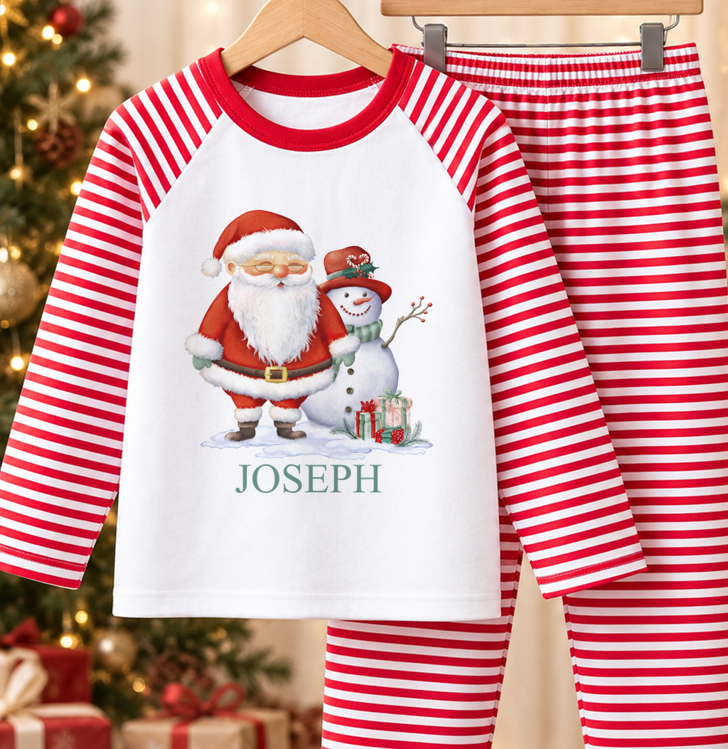 Personalised red and white striped kids Christmas pyjamas with Santa and Snowman design and a custom name printed on the front