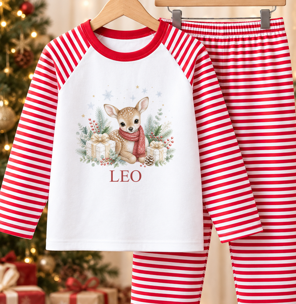 Personalised red and white striped kids Christmas pyjamas with Baby Deer Red Scarf design and a custom name printed on the front