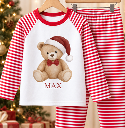 Personalised red and white striped kids Christmas pyjamas with Classic Santa Hat Teddy design and a custom name printed on the front